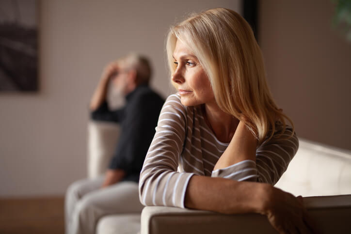 Older woman and man contemplating divorce