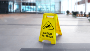 Caution wet floor sign in building
