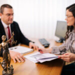 Woman meeting with employment law attorney
